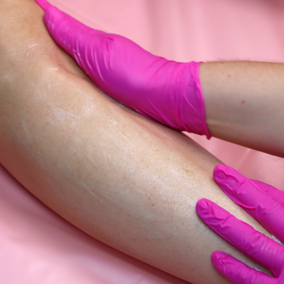 Pinkfishes After Wax Lotion being applied to a leg after waxing.