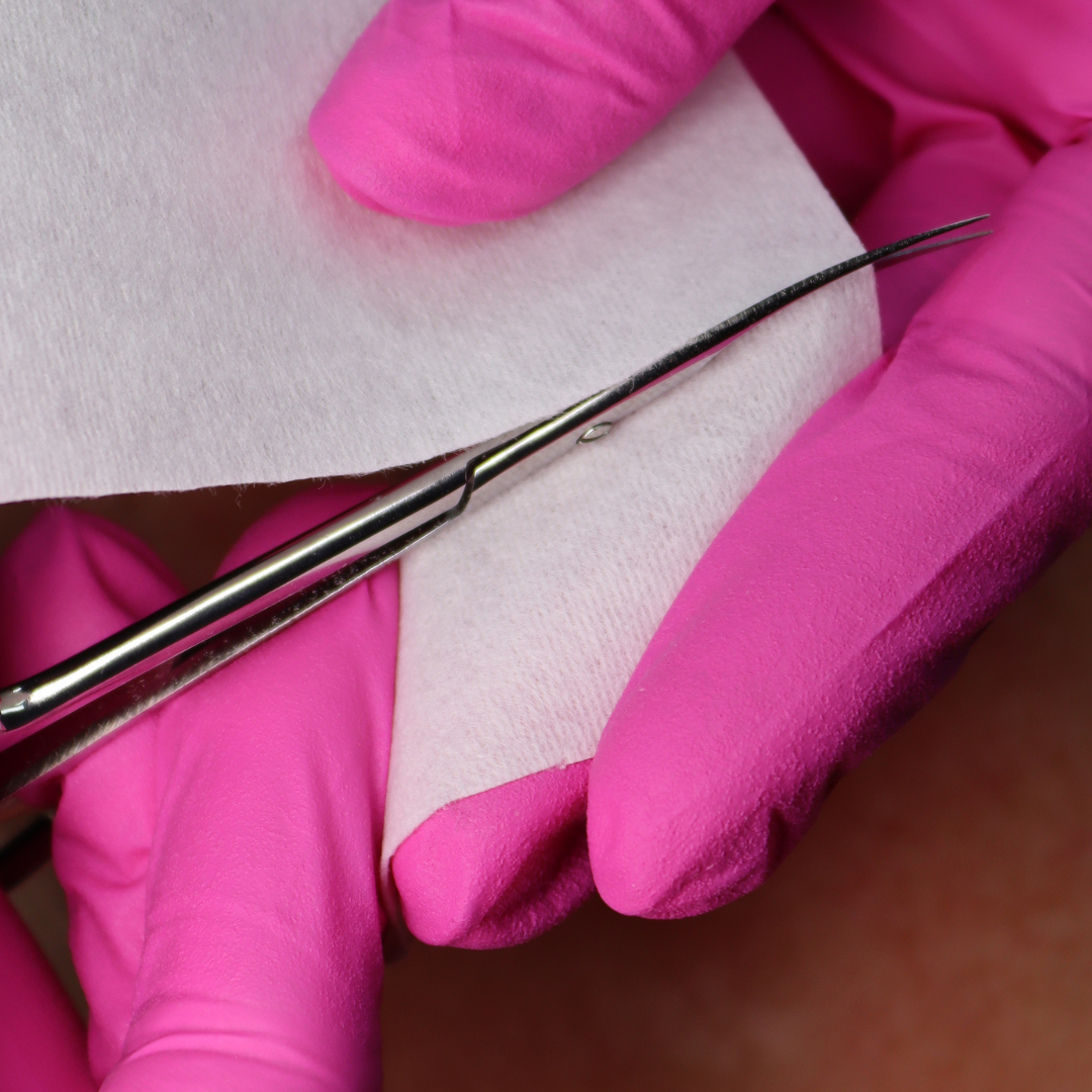 Showing cutting a wax strip.