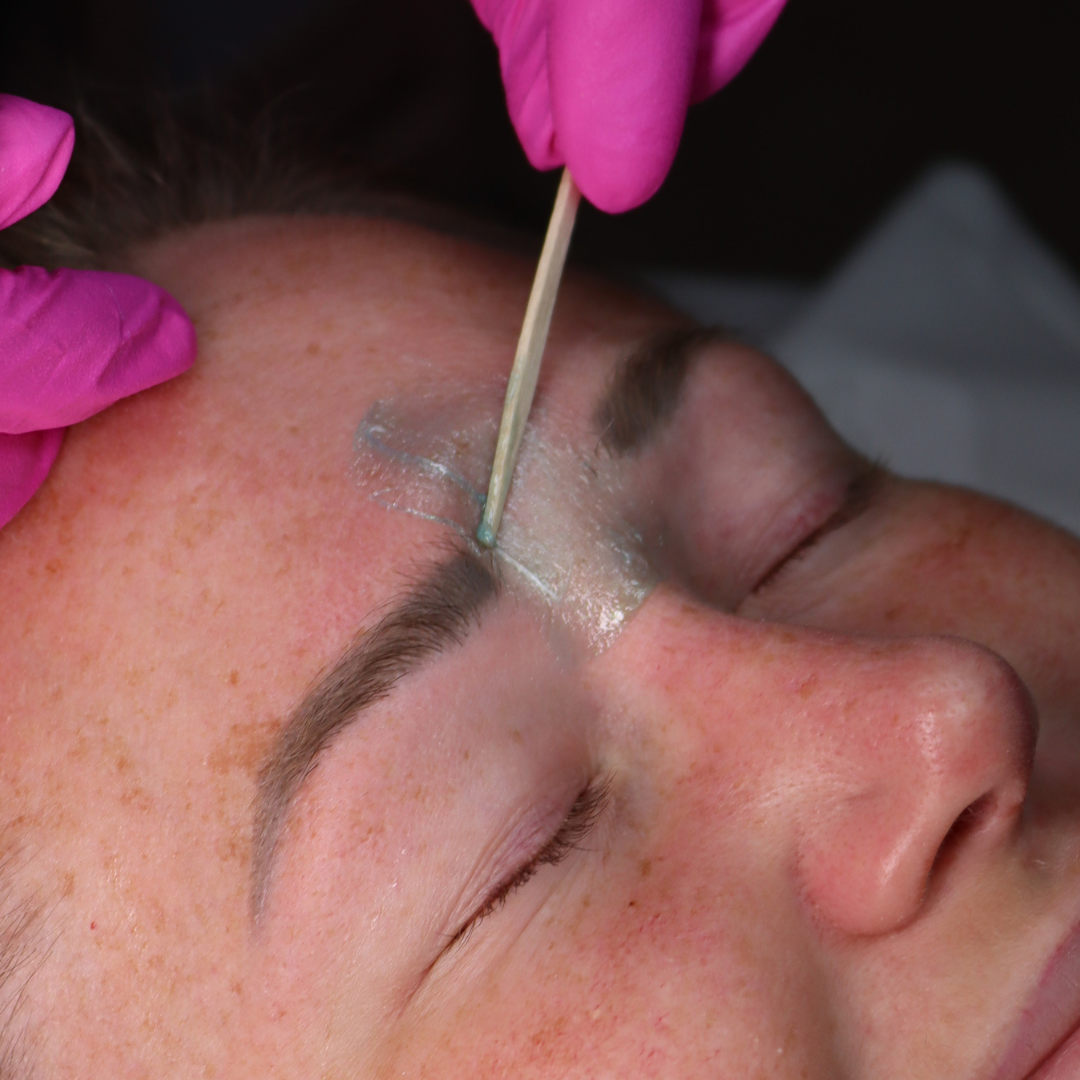 Facial Waxing Spatula and Lagoon Wax.