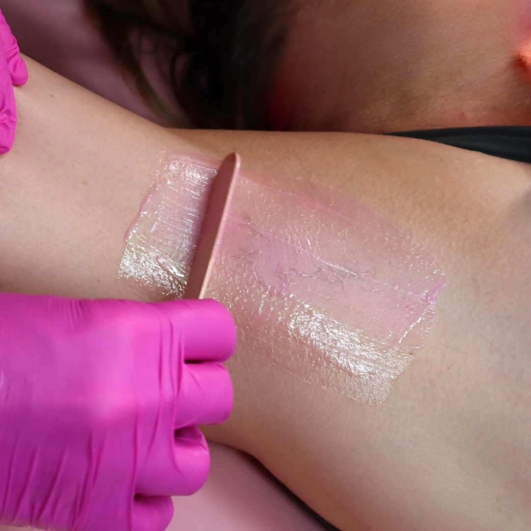 Pinkfishes Shell Strip waxing being used for hair removal on armpit. 